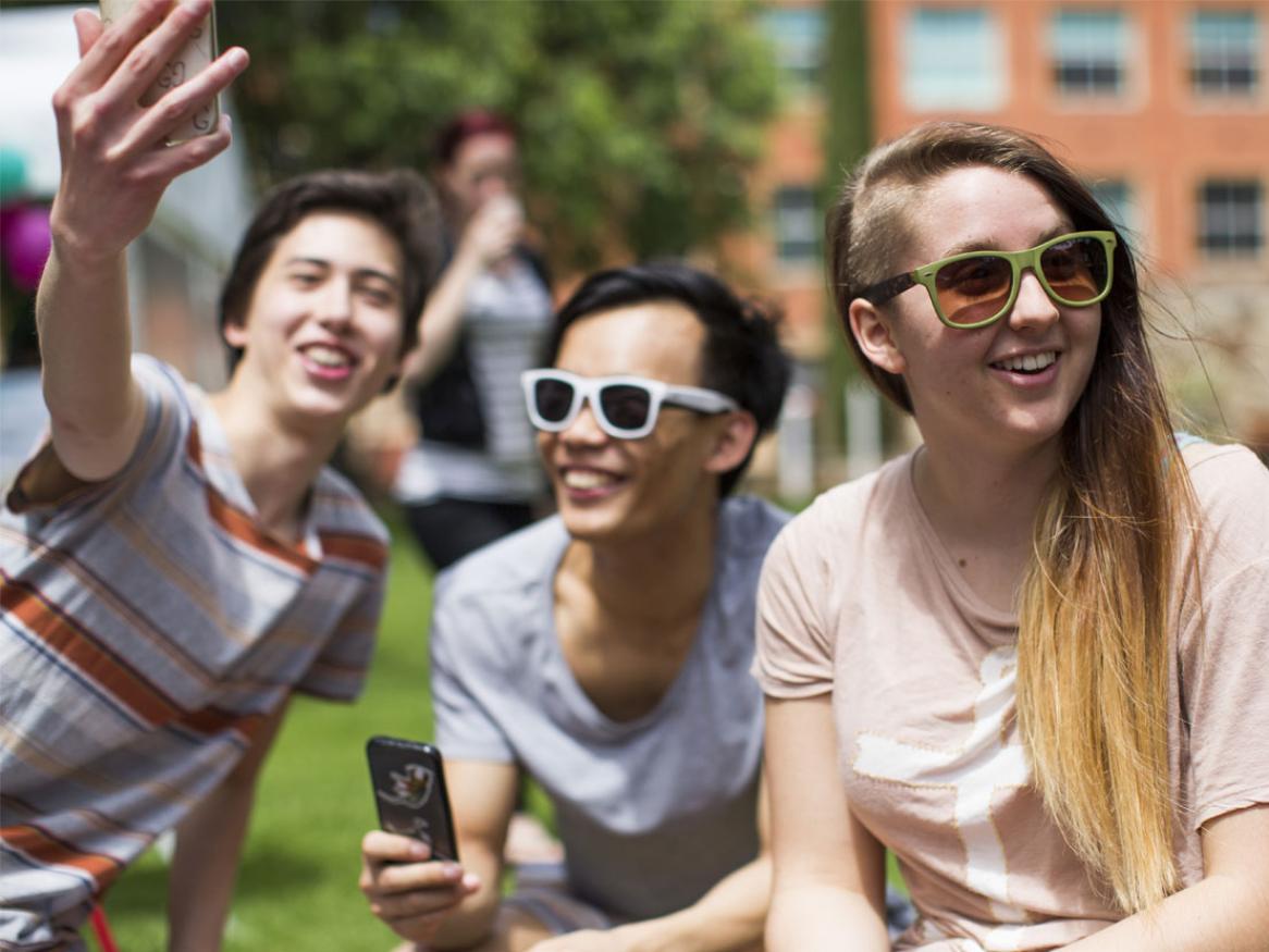 Students taking a selfie at the Student Union Stress Less event on the Barr Smith Lawns