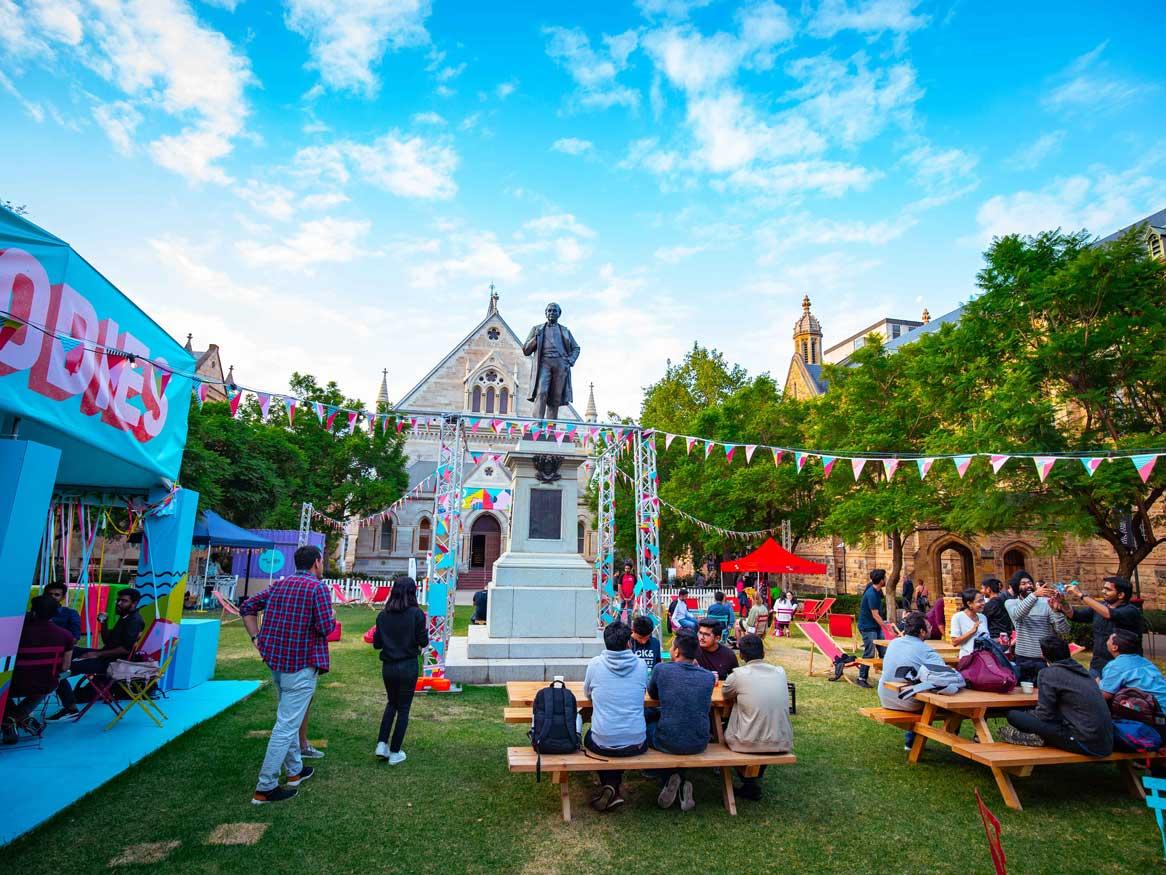 Students socialising at an event on the University campus
